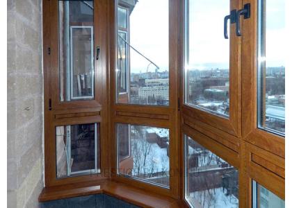 Французское остекление балкона профилем Veka с ламинированием под дерево в Мытищах