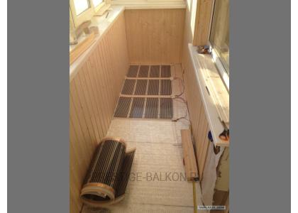 Теплое остекление лоджии пластиковыми окнами с теплым пленочным ИК полом в Мытищах