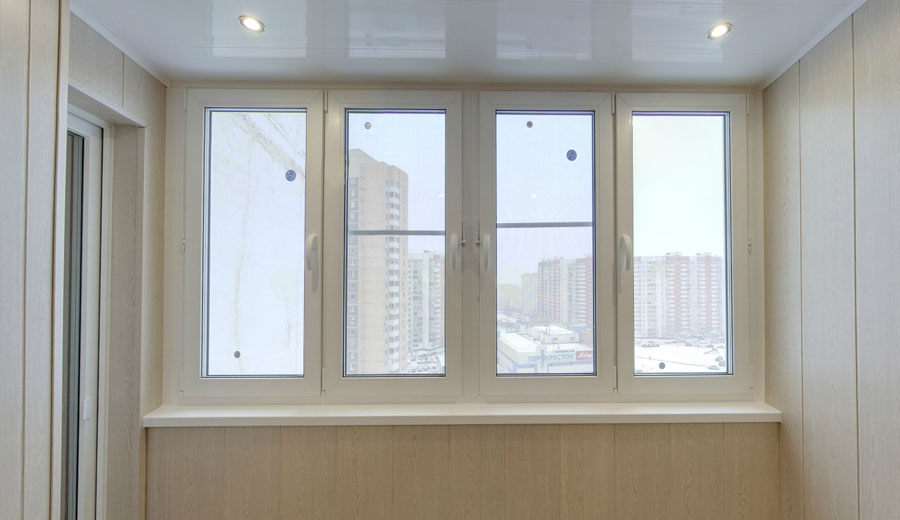 Тёплое остекление балкона профилем КВЕ и отделкой панелями ПВХ в Мытищах