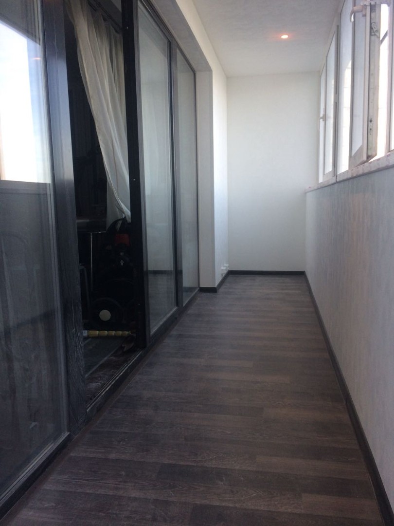 Теплое остекление профилем Rehau и объединение балкона с комнатой в Мытищах